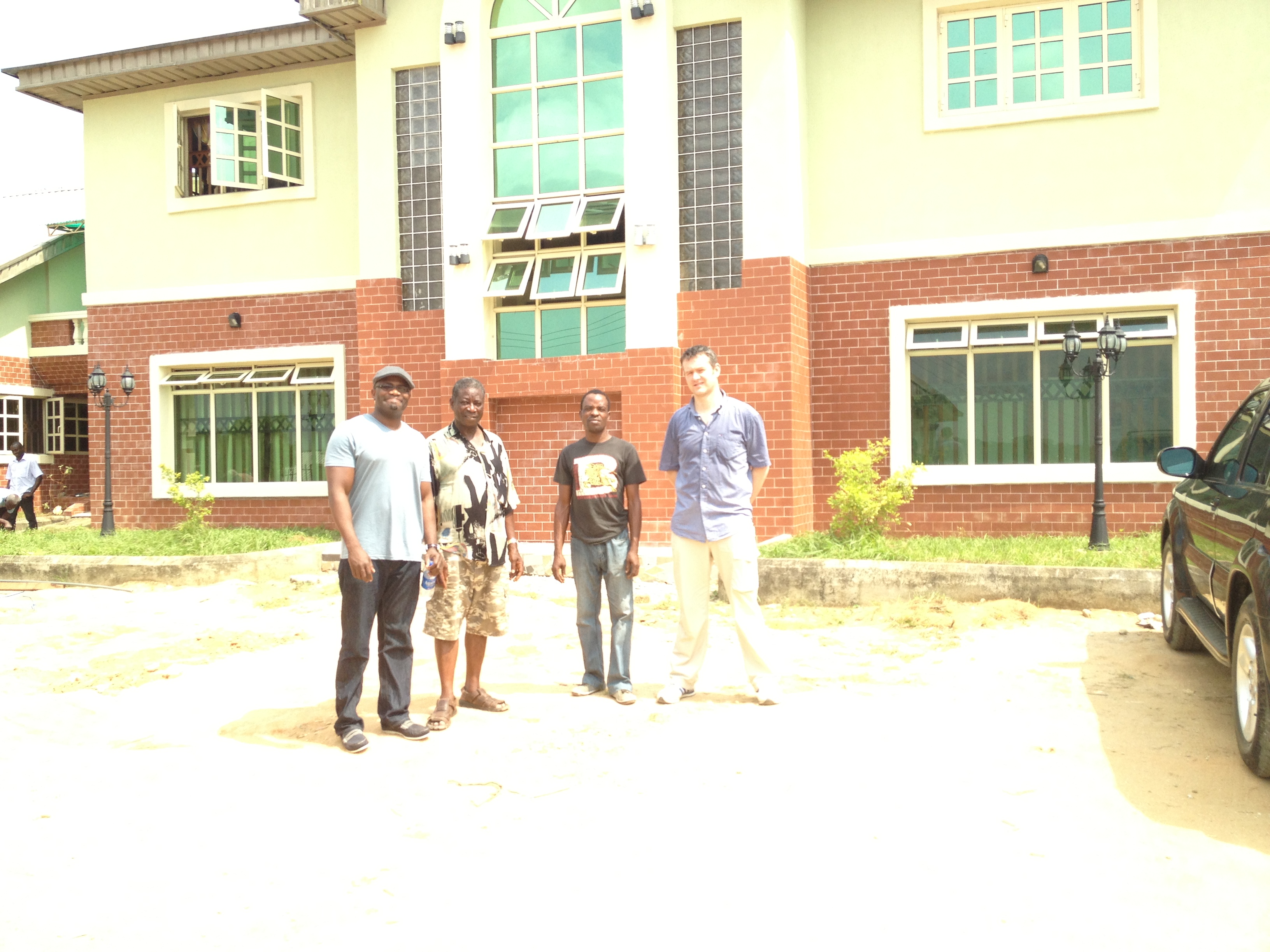 Dr Evaristus Udoisa MD with his son & a hospital electrician with myself at a set up of Equipment in a new Hospital in Calabar, Nigeria- December 2012